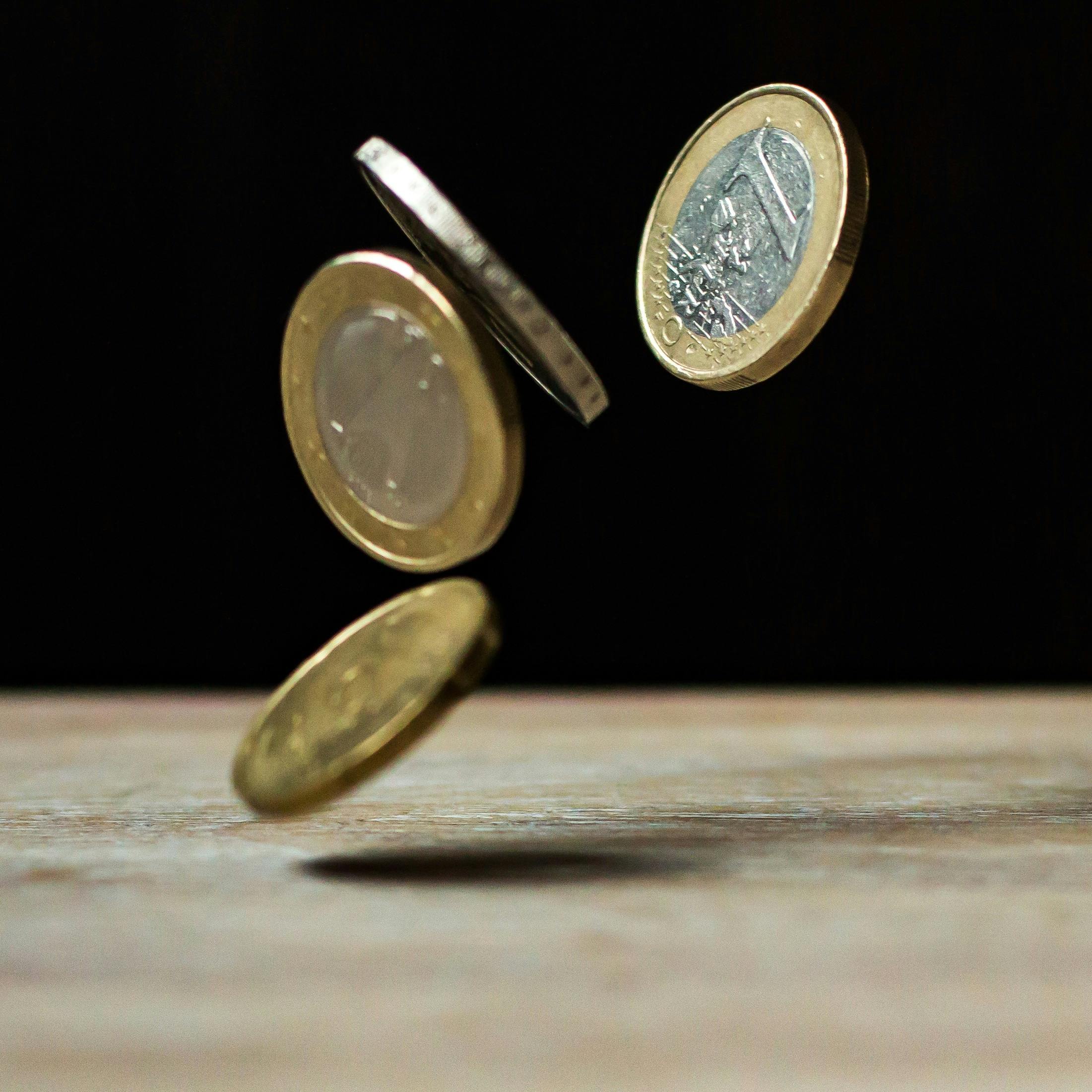 pexels-photo-210600-210600 Dynamic shot of euro coins appearing to float, symbolizing active economy.